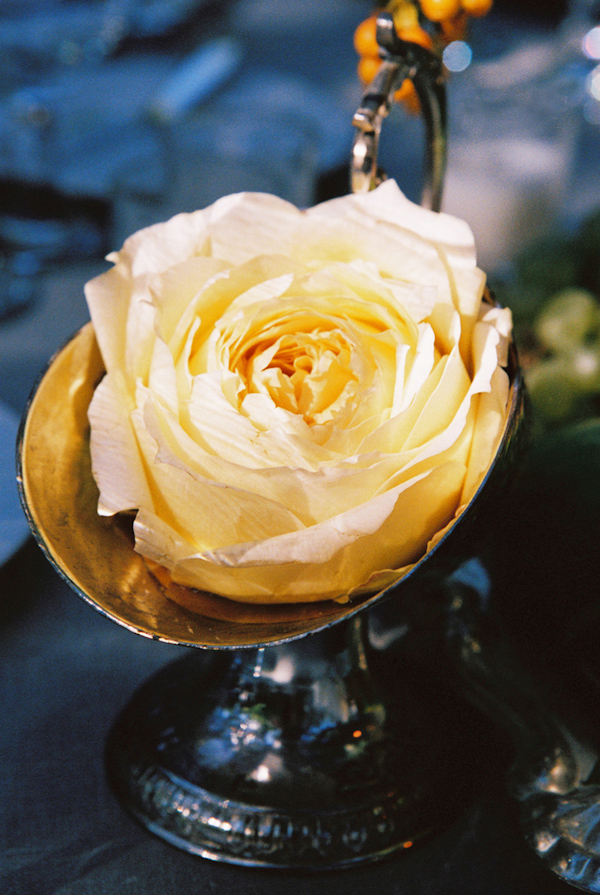 white rose and silver vintage vase wedding photo by Yvette Roman Photography